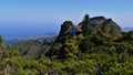Northeastern coast of Madeira, Portugal with green forest, mountains and restaurant for hikers near Pico Ruivo (1,862m).