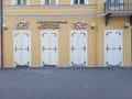 Closed white doors of Tourist Info Center in Novi Sad, Serbia. April 2022. Royalty Free Stock Photo