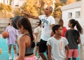 Northen Cyprus, Girne, Alsancak - Jule, 25, 2023: Basketball sport training for children. Group of teenagers around 7-14