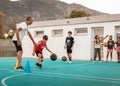 Northen Cyprus, Girne, Alsancak - Jule, 25, 2023: Basketball sport training for children teenagers around 7-14 years old