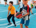 Northen Cyprus, Girne, Alsancak - Jule, 25, 2023: Basketball sports training for children teenagers around 7-14 years old. The
