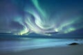 Northen light above ocean in the Norway Royalty Free Stock Photo