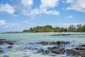 Rocky beach at Grand Gaube, North of Mauritius. Royalty Free Stock Photo