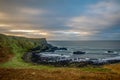 Northern Ireland Antrim Coast Ballintoy Harbour with rocks and sunset waves, beautiful scenery Royalty Free Stock Photo