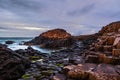 Morning view of a Causeway coast and glens with Giants Causeway and sea in Northern Ireland, UK Royalty Free Stock Photo