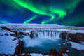 Northern Light, Aurora borealis at Godafoss waterfall in winter, Iceland