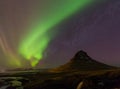 Northern light over Kirkjufell mountain Royalty Free Stock Photo