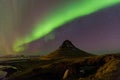 Northern Light over Kirkjufell volcano mountain night view Royalty Free Stock Photo