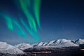 Northern lights above fjords, Norway