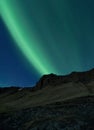 Northern Lights above Icelandic landscape
