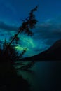 Northern Lights above lake with reflection of Aurora