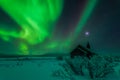 Northern lights Aisaroaivi chapel Royalty Free Stock Photo