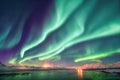 Northern Lights, also known as the Aurora Borealis, illuminating the night sky. Vibrant shades of green, purple, and Royalty Free Stock Photo