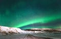 Northern lights Aurora borealis above Mountains Royalty Free Stock Photo