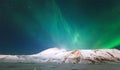 Northern lights Aurora borealis above Mountains Royalty Free Stock Photo