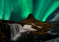 Northern lights aurora borealis appear over Mount Kirkjufell in Iceland. Royalty Free Stock Photo