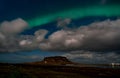 Northern lights aurora borealis appear over Mount Kirkjufell in Iceland. Royalty Free Stock Photo