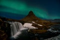 Northern lights aurora borealis appear over Mount Kirkjufell in Iceland. Royalty Free Stock Photo