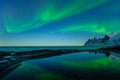 Northern lights, Aurora Borealis, Devil Teeth mountains in the background, Tungeneset, Senja, Norway Royalty Free Stock Photo