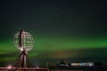 Northern lights, Aurora Borealis with the Globe, the monument at Nordkapp, North Cape, Norway Royalty Free Stock Photo