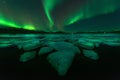 Northern lights aurora borealis in the night sky. Royalty Free Stock Photo