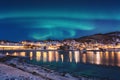 Scenic winter landscape with northern lights, Aurora borealis in night sky, Lofoten Islands, Norway Royalty Free Stock Photo