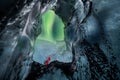 Northern lights aurora borealis over glacier ice cave. Royalty Free Stock Photo