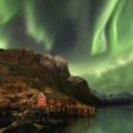 Northern lights in Lofoten islands, Norway. Green Aurora borealis. Starry sky with polar lights. Night winter landscape in night. Royalty Free Stock Photo