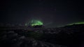 Northern Lights over the frozen Arctic fjord