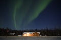Northern Lights over house in southcentral Alaska Royalty Free Stock Photo