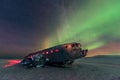 Northern lights over plane wreck on the wreck beach in Vik, Iceland Royalty Free Stock Photo