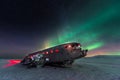 Northern lights over plane wreck on the wreck beach in Vik, Iceland Royalty Free Stock Photo