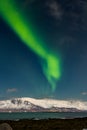 Northern Lights over the snowcapped Mount Esja in the Icelandic capital, Reykjavic