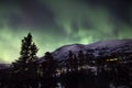 Northern Lights Over Snowy Alaskan Mountain Royalty Free Stock Photo