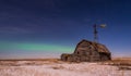 Northern Lights over vintage barn, bins and windmill in Saskatchewan Royalty Free Stock Photo