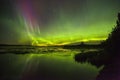 Northern lights over Watson Lake in Alaska