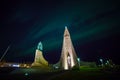 Northern lights shining over the church in Reykjavik