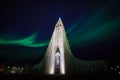 Northern lights shining over the church in Reykjavik