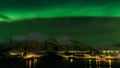 Northern lights on the snowy mountains