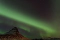 Northern Lights swirling around Kirkjufell, Iceland