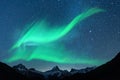 Northern lights in winter mountains Royalty Free Stock Photo