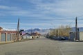 Northern Mongolia. The city of Ulgiy. Measured city life in the sunlight, local Mongolian people on the street moving about their