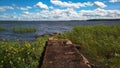 Northern nature. Old pier on the sea and wind Royalty Free Stock Photo