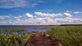 Northern nature. Old pier on the sea and wind Royalty Free Stock Photo