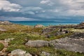 Northern polar summer in the tundra. Hill. Coast of the Arctic Ocean, Barents Sea beach, Russia Royalty Free Stock Photo