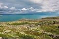 Northern polar summer in the tundra. Hill. Coast of the Arctic Ocean, Barents Sea beach, Russia Royalty Free Stock Photo
