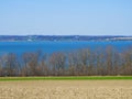 Northern springtime side view of Cayuga Lake