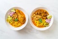 Northern Thai noodle curry soup with chicken and braised pork Royalty Free Stock Photo