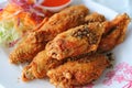 Northern Thai Style Deep Fried Chicken Wing with Hot and Spicy Herbs Royalty Free Stock Photo