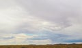 Northern Utah USA landscape with mountaind in distance under bug overcast beautiful sky